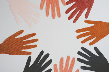 Fototapeta premium International Day for Tolerance with the eight hands in a circle. Isolated on grey background. 