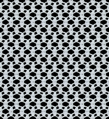 Snow white seamless knitted texture. Beautiful openwork lace crocheted. Cotton yarn. Guipure on a black background.