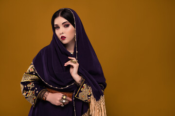 Photo of pretty lady arabian princess wear hijab for travel long desert for wealthy sultan over...