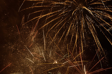 Night sky full of fireworks explosions, celebrations an festivities