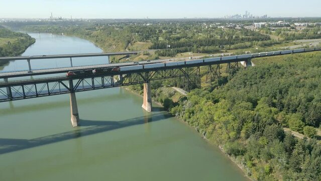 Train on the 1908 bridge in Edmonton with the skyline in the background
