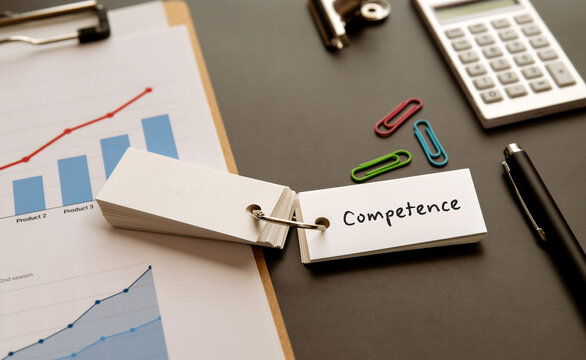 There is word card with the word Competence. It is as an eye-catching image.