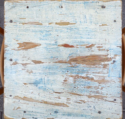 Fototapeta na wymiar Rustic painted wood boards with dry peeling grunge paint 