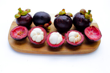 Fresh mangosteen fruit on white background.