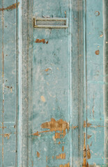 Rustic painted wood boards with dry peeling grunge paint
