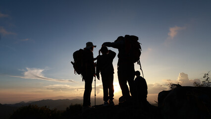 Backpacker family with daughter travel in forest