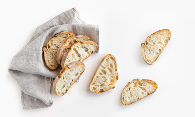 French ciabatta sliced several pieces bread on white background