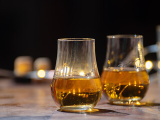 Speyside whisky glasses of whisky, single malt and blended scotch whisky served in bar in...