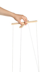 Woman pulling strings of puppet on white background, closeup