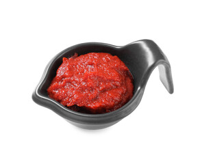 Gravy boat with tasty tomato paste isolated on white