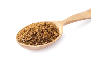 Spoon of aromatic caraway (Persian cumin) powder isolated on white
