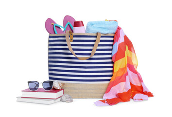 Stylish bag, books and other beach accessories isolated on white