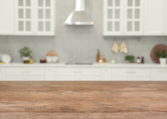 Fototapeta na wymiar Empty wooden table in kitchen, space for design
