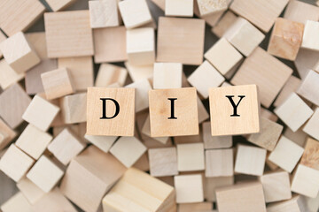 DIY (do it yourself) concept. Abstract geometric wooden dice. DIY  icon. 