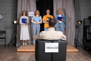 Actors casting with producer in audition room