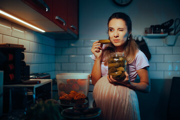 Pregnant Mother to be Craving some Pickles at Night. Funny girl smelling pickles in vinegar for...