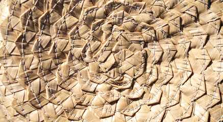 close up of a straw hat texture in the sun for abstract background