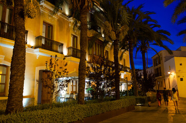 After dusk in Ibiza's historic old town. Historic buildings and cathedrals shimmer in this...