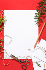 Beautiful composition with blank Christmas card on red background
