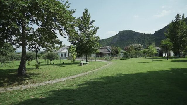 Panning from the left to the right side of the frame showing the expanse of Baba Vanga's former residence, the famous Balkan Nostradamus, located in Rupite, Petrich in Bulgaria.