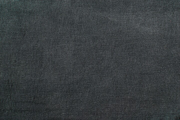 Black denim background. Flat lay.