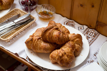 Fresh croissants on a plate