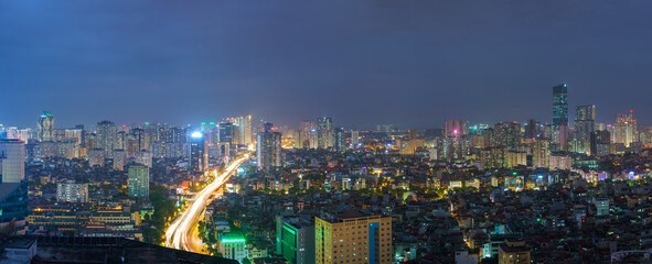 Fototapeta premium Cityscape of Hanoi skyline at Nguyen Chi Thanh street, Dong Da district during sunset time in Hanoi city, Vietnam in 2020