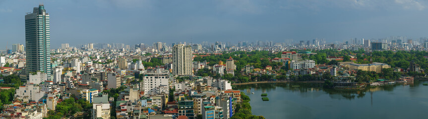 Fototapeta premium Hanoi cityscape with skyline view during sunset period at West Lake ( Ho Tay ) in 2020