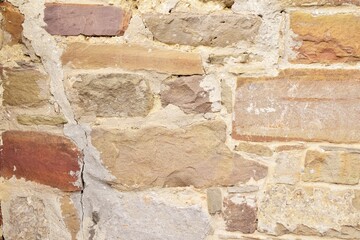 Background from part of a wall made of natural stone