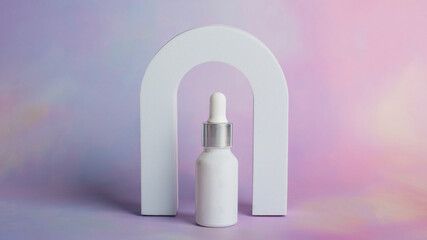 Plastic white tube for cream or lotion. Skin care or sunscreen cosmetic on colorful background.