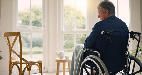 Wheelchair, senior man or thinking of memory by window in nursing home or retirement with...