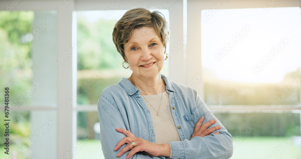 Poster Senior woman, portrait and arms crossed in retirement, morning and home with happiness and health. Elderly, person and smile on face in house to relax with sunshine in apartment, lounge or vacation