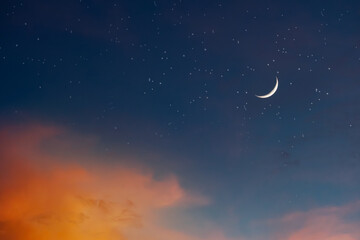 Fototapeta premium Background night sky of with crescent moon,and stars .Background Greeting card for the holy month of Ramadan of islam