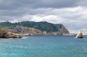 Fototapeta na wymiar Beautiful sights in Ibiza Spain of the rugged coast, Mediterranean sea and charming architecture 