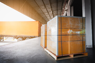 Package Boxes Wrapped Plastic Stacked on Pallets. Trucks Loading at Warehouse Dock. Cargo Container, Distribution Warehouse Shipping, Supply Chain Supplies, Shipment. Freight Truck Logistic Transport.