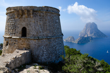 Fototapeta premium Beautiful sights in Ibiza Spain of the rugged coast, Mediterranean sea and charming architecture 