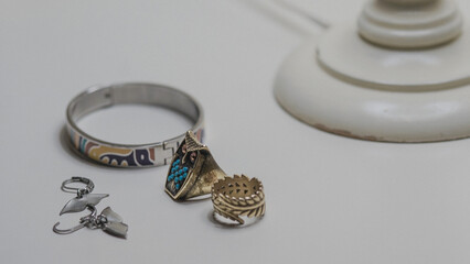 My jewelry on the bedside table