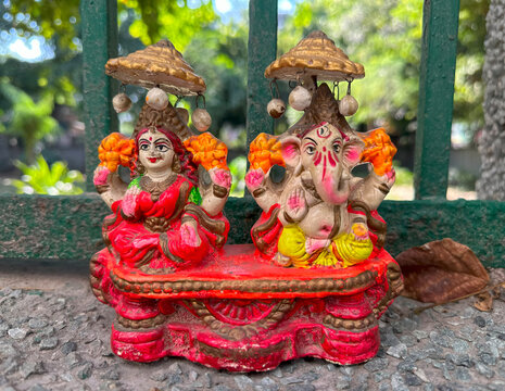 sculpture of god ganesha and laxmi