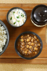 Chole Chawal or Chole Masala Rice With Raita, Indian dish