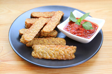 Delectable Pan fried Tempeh with marinara sauce, an easy dish of whole foods plant based diet