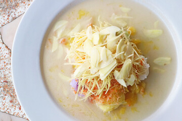 Khanom Chin Sao Nam, Thai Rice Vermicelli Served with Chopped Fresh Fruit and Vegetable with Ground Dried Shrimp in Coconut Milk Soup