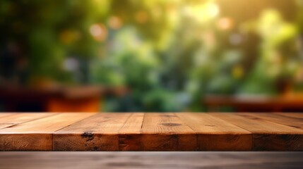 Empty wooden table for product display montages with bokeh background.