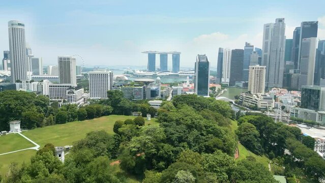 Drone shot of Fort Canning park with views of Marina Bay, Singapore