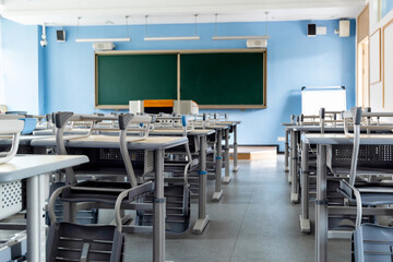 School classroom with desks and chairs