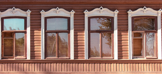 Fototapeta na wymiar Window in an old wooden house. Background