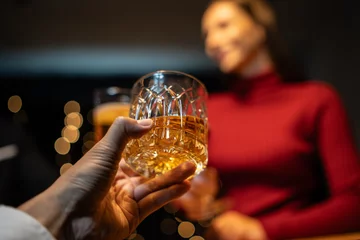 Gardinen Celebrate whiskey on a friendly party in  restaurant © aekachai