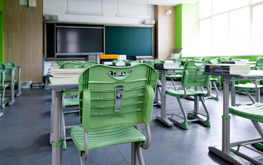 Stack of books on the desks