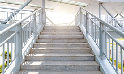 Stairs leading to pedestrian overpass