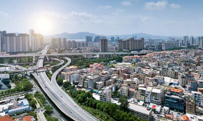 Fototapeta na wymiar Aerial of city overpasses and buildings