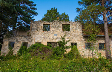 Fototapeta na wymiar A building in a small abandoned village in Vodenica near Brestovac in the Bosanski Petrovac municipality, Una-Sana Canton, Federation of Bosnia and Herzogovina
